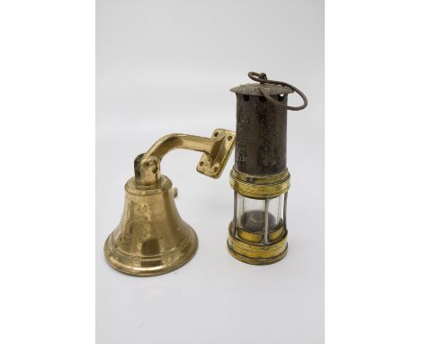 A brass and iron Davey lamp and a heavy brass bell (2).