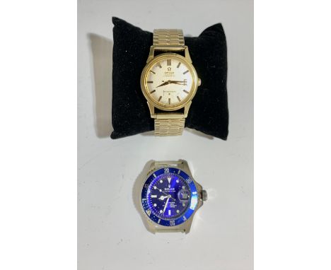 A Omega automatic, chronometer, constellation gold plated wrist watch and one other wrist watch.Condition report: Back logo m