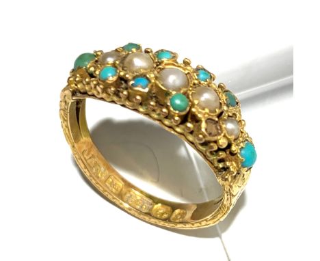 A 15ct gold Victorian ring set with pearls and turquoise.