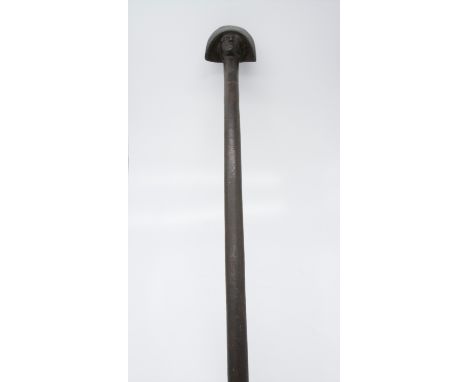 A 19th century hardwood walking stick, the terminal carved with the head of a naval officer wearing a bicorn hat worn athwart