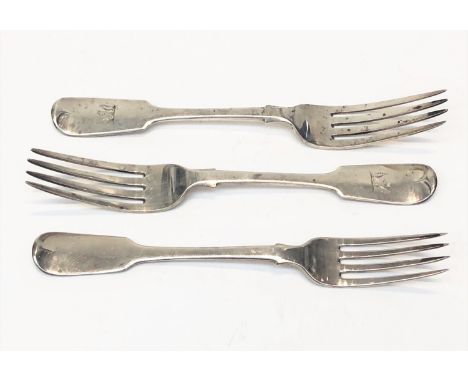 A pair of Georgian silver fiddle pattern table forks together with an early Victorian silver fiddle pattern table fork, 7.3oz