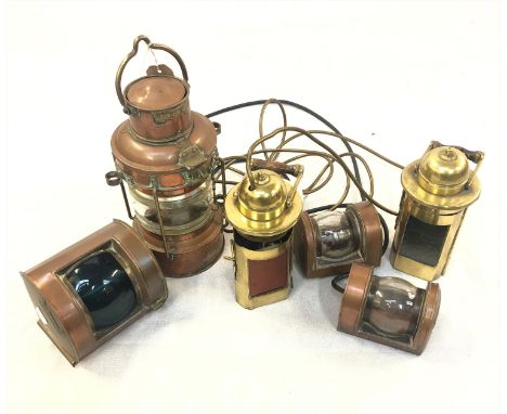 A ship's copper anchor lamp, height 34cm, together with five other assorted maritime lamps. The pair of brass binnacle lamp h