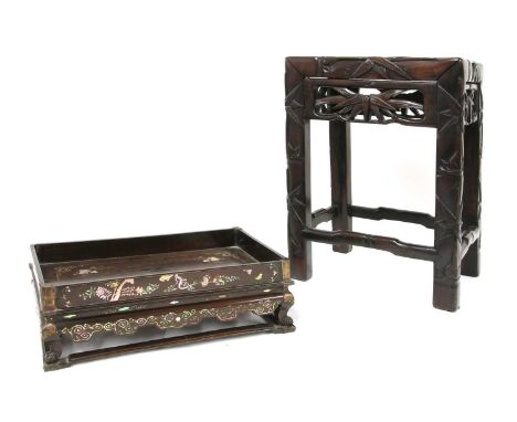 A Chinese hardwood stool, 19th century, the rectangular top above pierced aprons carved with bamboo, the legs similarly decor