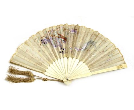 A Chinese ivory brisé fan,19th century, the guards carved with an oval cartouche of peony, the silk leaves embroidered with a