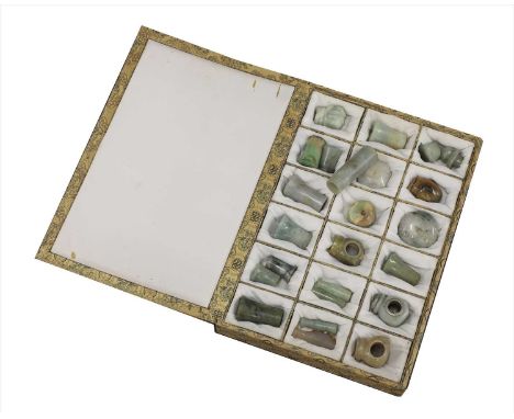 A collection of Chinese opium pipe terminals and mouthpieces,Qing dynasty (1644-1911), of jade, agate or hardstone, various s