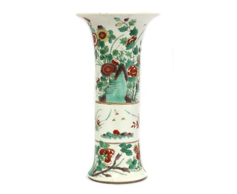 A Chinese wucai gu vase, early 20th century, of cylindrical form with flared mouth and foot, painted with butterflies and ins