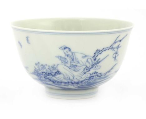 A Chinese blue and white tea bowl, of rounded form with a flared rim rising from a circular foot, painted with a literatus, p