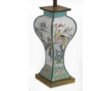 A Chinese Canton enamelled table lamp and shade,20th century, the vase of lozenge baluster shape on a metal base, painted wit