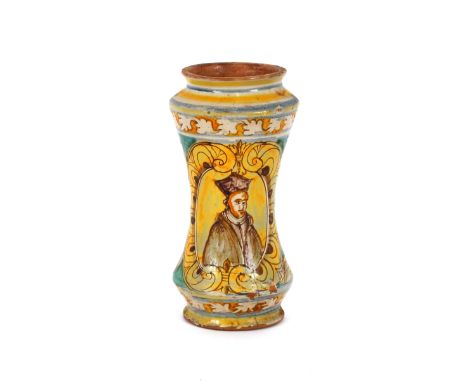A glazed earthenware&nbsp;albarello,&nbsp;decorated with an oval panel of a priest surrounded by foliate scrolls with yellow,