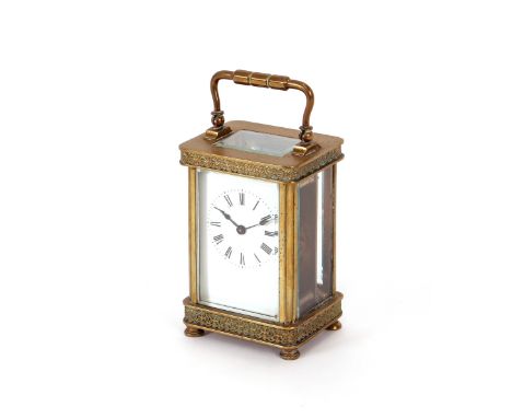 A French&nbsp;brass cased carriage&nbsp;timepiece, impressed to the back plate R &amp;Co. Made in Paris, having filigree work