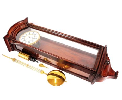 A Victorian walnut cased regulator type wall clock,&nbsp;with adjustable pendulum, circular Roman numeral enamel and brass mo