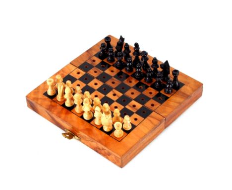 A figured walnut and inlaid folding travelling chess set