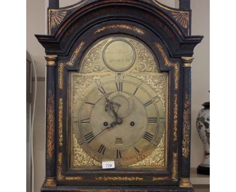 A late 18th Century lacquered and chinoiserie decorated long case clock,&nbsp;the hood surmounted by a pagoda pediment and br