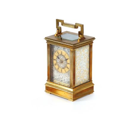 A brass cased carriage clock,&nbsp;&nbsp;the movement striking on a gong with repeat button, Roman numeral chapter ring, and 