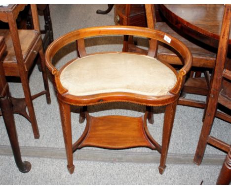 An Edwardian&nbsp;mahogany boxwood strung and chequer banded kidney shaped dressing stool, fitted under tier and raised on sq
