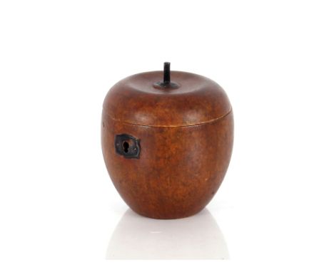 A Georgian style wooden tea caddy, in the form of an apple, the hinged lid with metal stalk and escutcheon, 14cm high