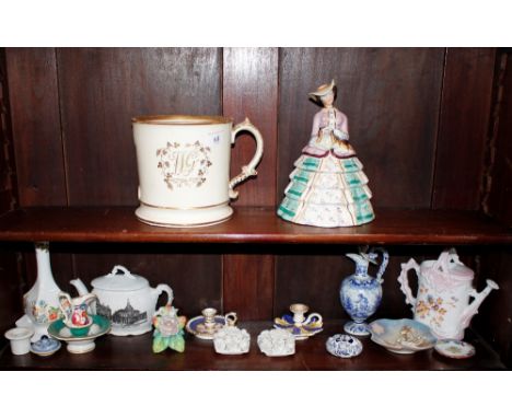 Two 19th Century floral decorated porcelain chamber sticks;&nbsp;a miniature porcelain jug and basin; a Faience ware baluster