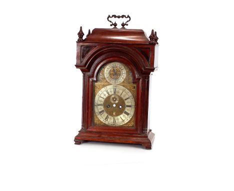 An unusual 18th Century mahogany cased bracket clock,&nbsp;with brass foliate engraved dial, with steel chapter ring and subs