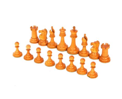 A turned wooden chess set;&nbsp;and an old slate cribbage board&nbsp;
