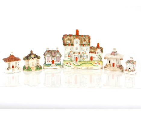 Five various Staffordshire pastel burner cottages;&nbsp;and a Staffordshire flat back study of Pot Ash Farm (6)