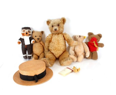 Three various vintage Teddy bears;&nbsp;a modern Steiff Teddy bear; a miniature example with certificate; another; and a stra