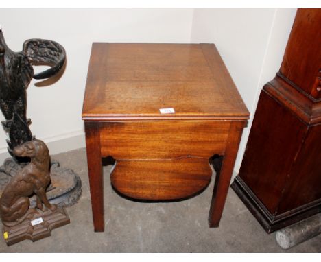 A 19th Century mahogany box commode,&nbsp;raised on square section supports, 46cm wide, 48cm deep, 50cm high