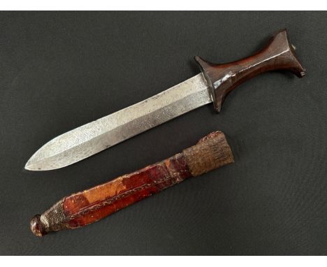 African Dagger with double edged blade 87 mm in length. Geometric pattern decoration to the blade. Wooden grip. Overall lengt