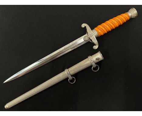 WW2 Third Reich Heer Officers Dienstdolch dagger with double edged blade 252mm in length. No makers mark. Orange Trolon grip.