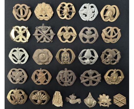 A collection of Royal Netherlands Army Cap Badges. 