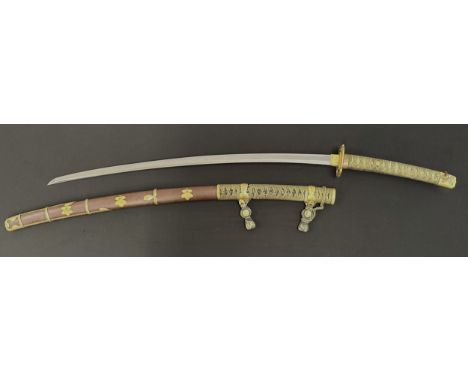 Japanese Katana Sword with single edged blade 755mm in length with Hamon line to the cutting edge. Tang is signed to both sid