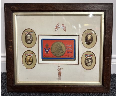 British Boer War framed display showing a printed copy of the Queen Victoria gift tin surrounded by four printed enamel plaqu