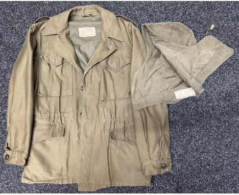 WW2 US Army Jacket Field M1943. With original label to neck and pocket. Size 36 R. Complete with hood which also retains it's