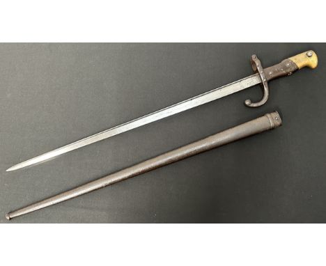 French Gras Bayonet with single edged blade 520mm in length. Maker marked and dated to spine of blade "St. Etienne 1879". Ove