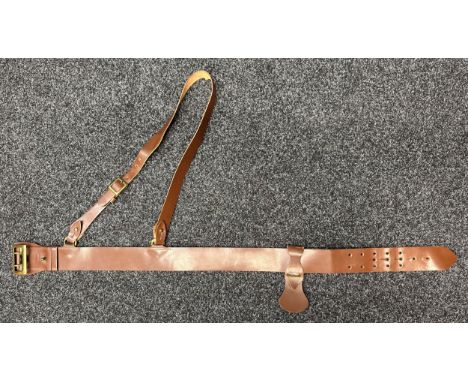 WW2 US Army Officers Brown Leather Sam Brown Belt. Brass buckle. Maker marked "Service Genuine Shell Cordova". Along with siz