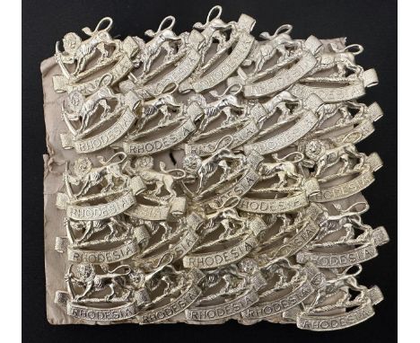 25 Rhodesian Army Cap Badges still on card of issue. 