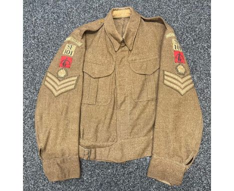 WW2 British Home Guard Battledress Blouse complete with all originally sewn insignia for a Staff Sgt in the Derbyshire Home G