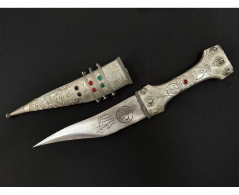 Middle Eastern Jambiya Dagger with curved double edged blade 160 mm in length. Arabic inscription along with etched decoratio