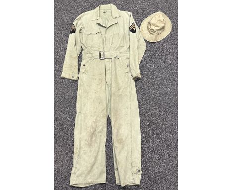 WW2 US Army HBT Coveralls with Tech 5th Grade rank stripes. Complete with belt and all buttons. Label is washed out. Size app