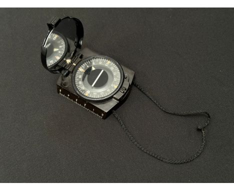 WW2 Third Reich Bakelite Marching Compass. Working order. Complete with original cord. Maker code marked to underside. 