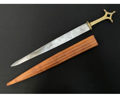 Dagger with double edged blade with punch mark decoration, 364mm in length. Cast brass grip. Overall length 490mm. Complete w