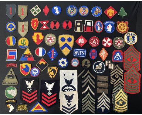 A collection of WW2 and later US Army Shoulder Sleeve Insignia. Includes some rank stripes and USN insignia. 