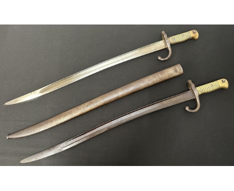 French Chassepot M1866 Bayonet with single edged fullered blade 575mm in length. No makers mark. Brass grip with working rele