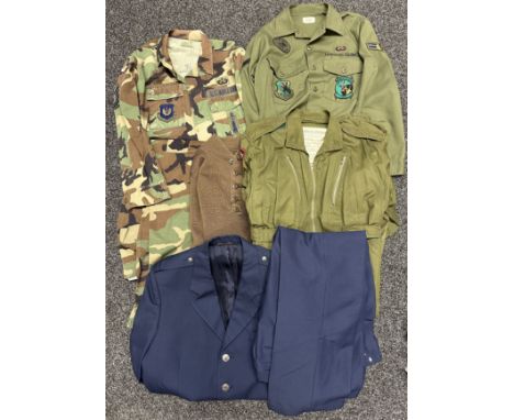 Collection of post war USAF uniforms to include: USAF Coat, Hot Weather, Woodland Camo pattern Combat, complete with full ins