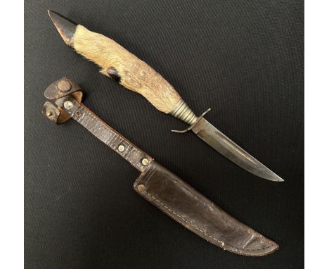 German Hunting Knife with single edged fullered blade 90mm in length. Maker marked "Baron, Solingen, Germany". Recurved cross