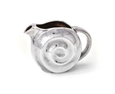 A silver coloured water jug by Tiffany &amp; Co., post 1965 stamped marks, with plain loop handle and a snail-form scroll mou