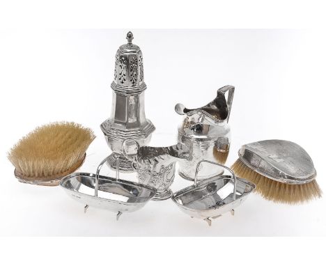 A pair of silver novelty sweet dishes by James Dixon and Sons, Sheffield 1937, each formed as a garden trug, 11.5cm(4 1/2in) 