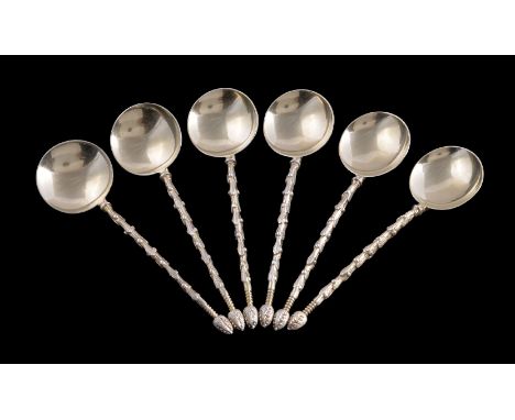 A set of six Victorian silver gilt spoons by Martin, Hall &amp; Co., Sheffield 1864, with circular bowls, leaf and bead handl