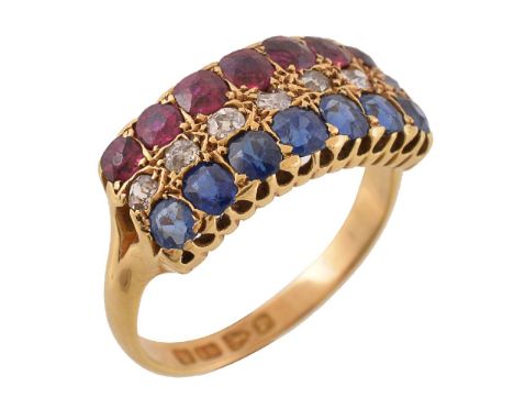 A late Victorian ruby, sapphire and diamond dress ring, the rectangular panel with a row of oval cut rubies and sapphires wit