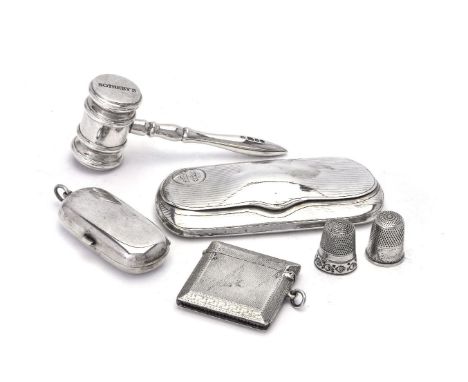 A silver gavel by S. J. Phillips, London 1994, engraved Sotheby's 1744-1994, 10cm (4in) long; a plain oblong sovereign and ha