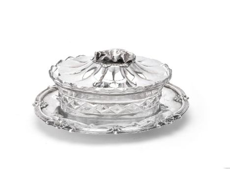 A William IV silver shaped oval butter dish by Charles Ratherham, Birmingham date worn, with a recumbent cow finial to the lo